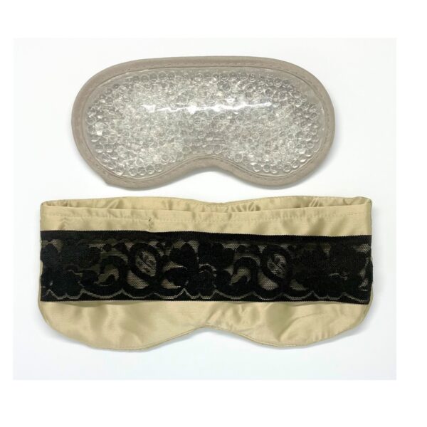 A pair of eye masks are laying on top of each other.